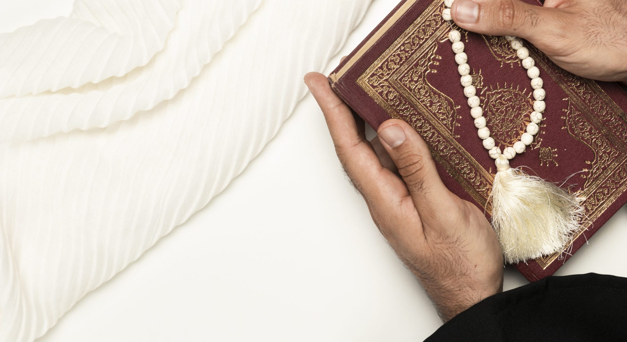 priest-holding-holy-book-bracelet